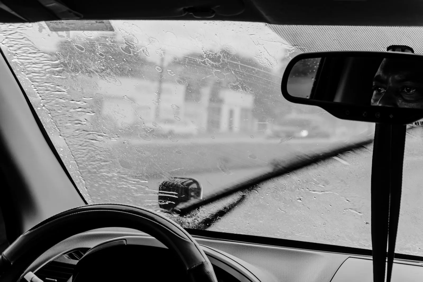 Driver view through a rainy windshield in West Melbourne